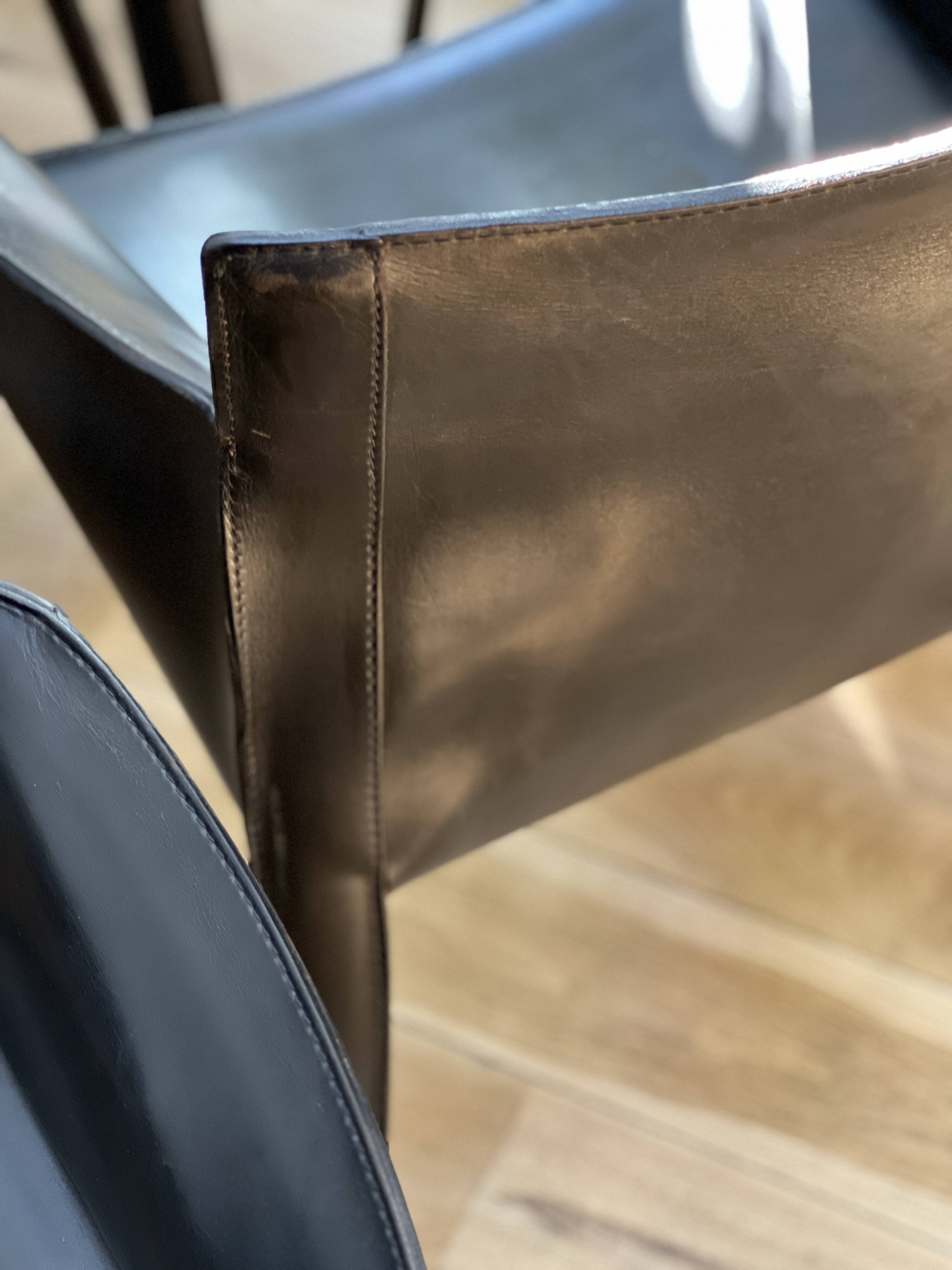 Set of 6 black leather armchairs from the 1970s