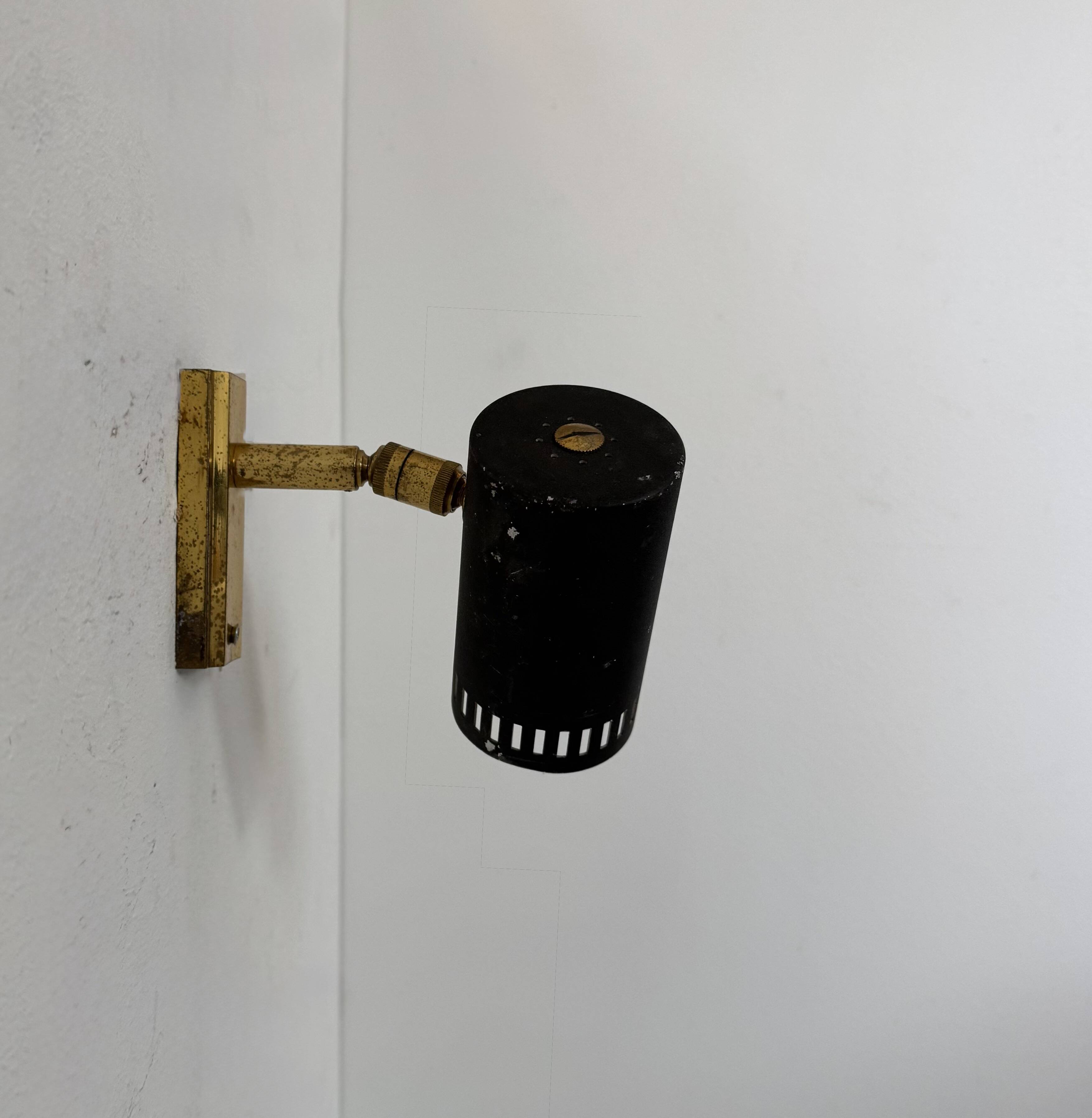 Vintage adjustable wall light, brass and matte black metal, France, 1960.