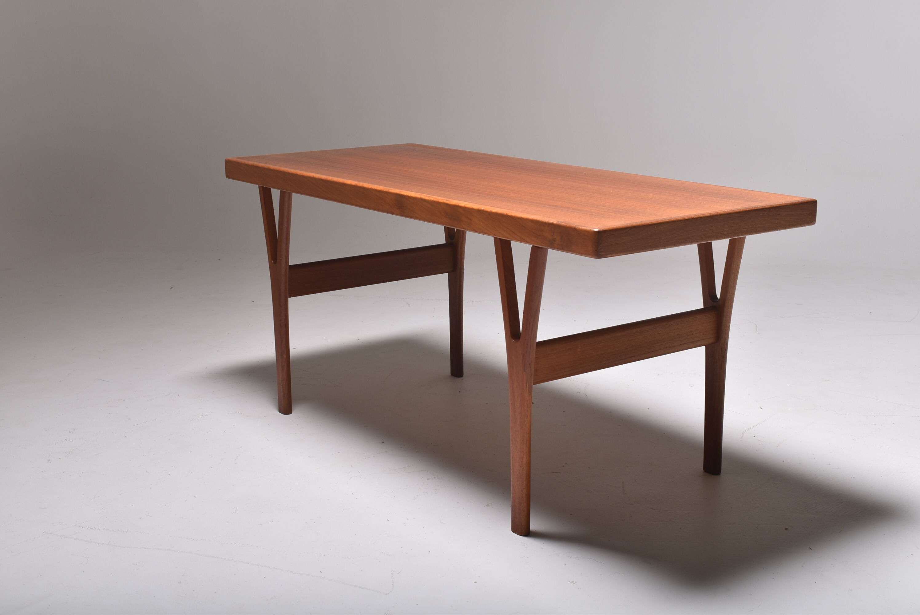 Scandinavian coffee table Trioh in teak