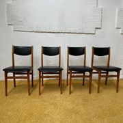 4 Scandinavian chairs in teak and black faux leather.