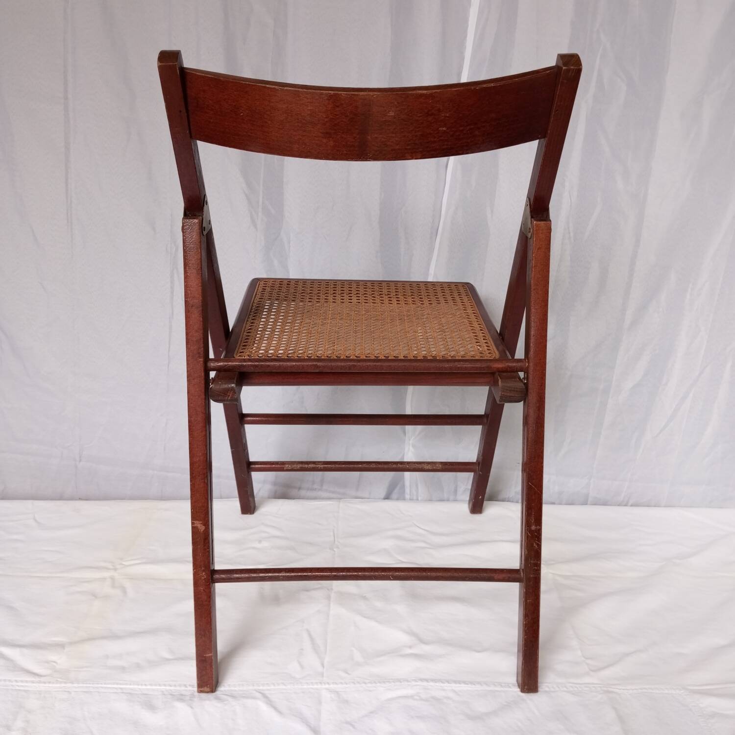Folding wooden and cane chairs