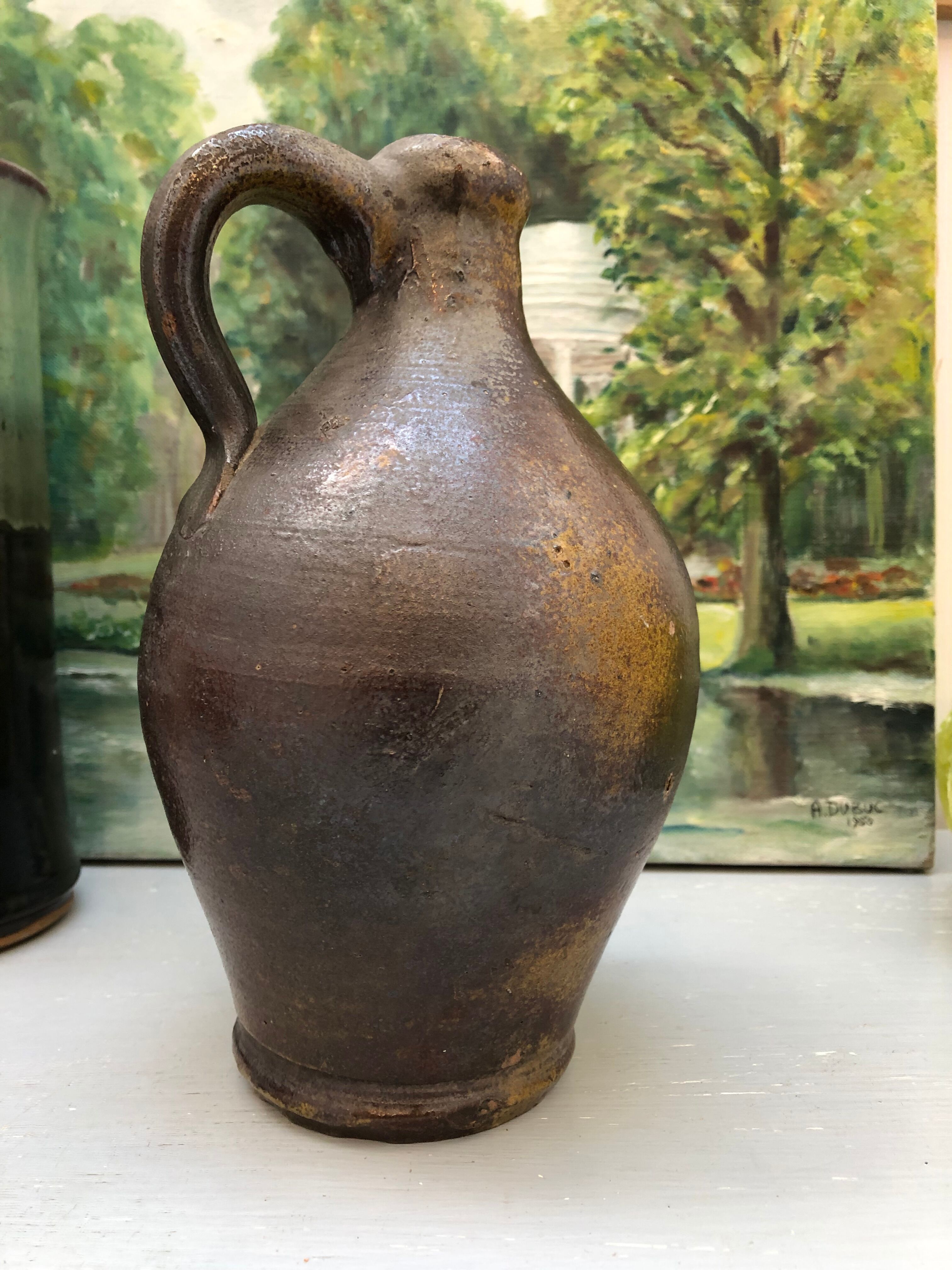 Pitcher in glazed earth in chocolate tones