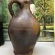 Pitcher in glazed earth in chocolate tones