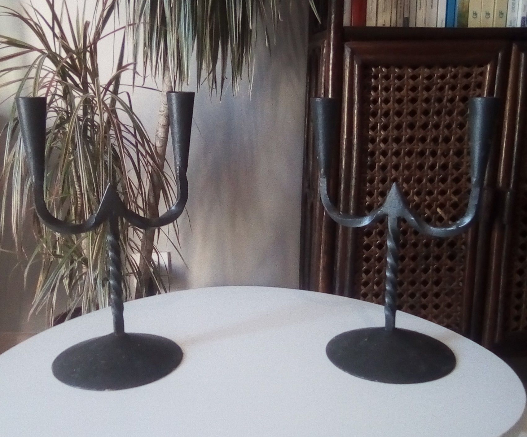 Pair of ancient wrought iron chandeliers in medieval high era 17th century