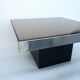 Square pedestal coffee table with mirror top
