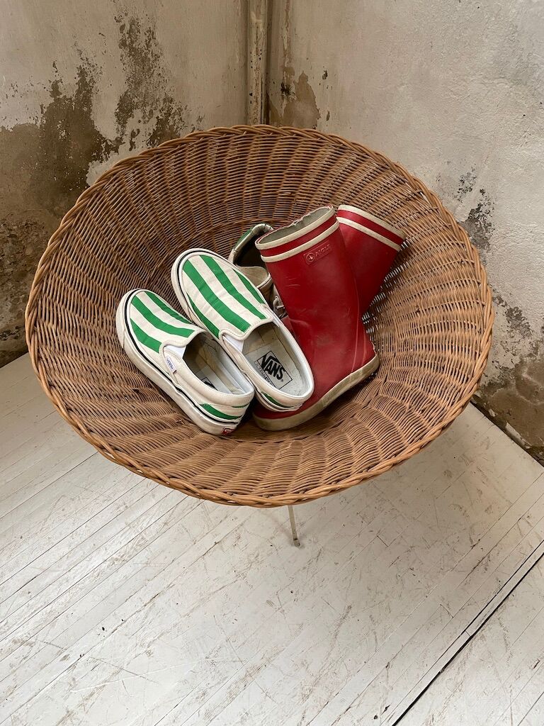 Wicker garden basket on tripod support