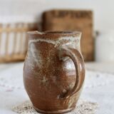Small vintage hand turned ceramic milk jug with rustic glaze