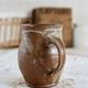 Small vintage hand turned ceramic milk jug with rustic glaze