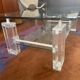Coffee table made of glass and plexiglass.