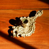 Bougeoir à main en bronze rat de cave