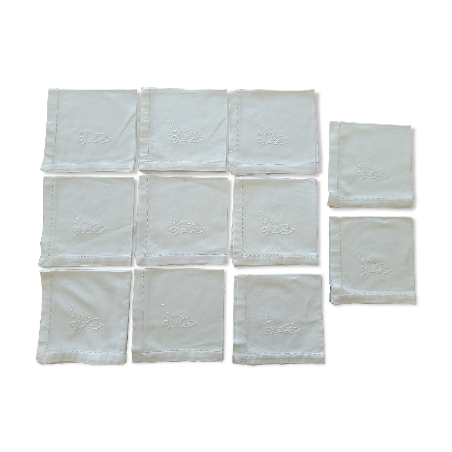 11 white embroidered towels