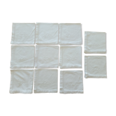 11 serviettes blanches brodées