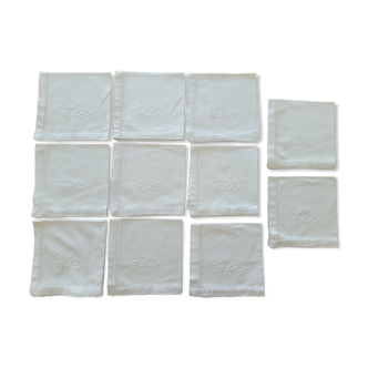 11 white embroidered towels