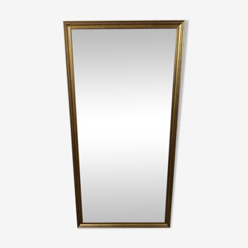 Large beveled mirror with gold frame