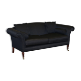 Three-seater Art Deco canapé with a light hardwood frame.
