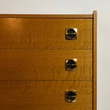 Vintage wooden chest of drawers with compass feet