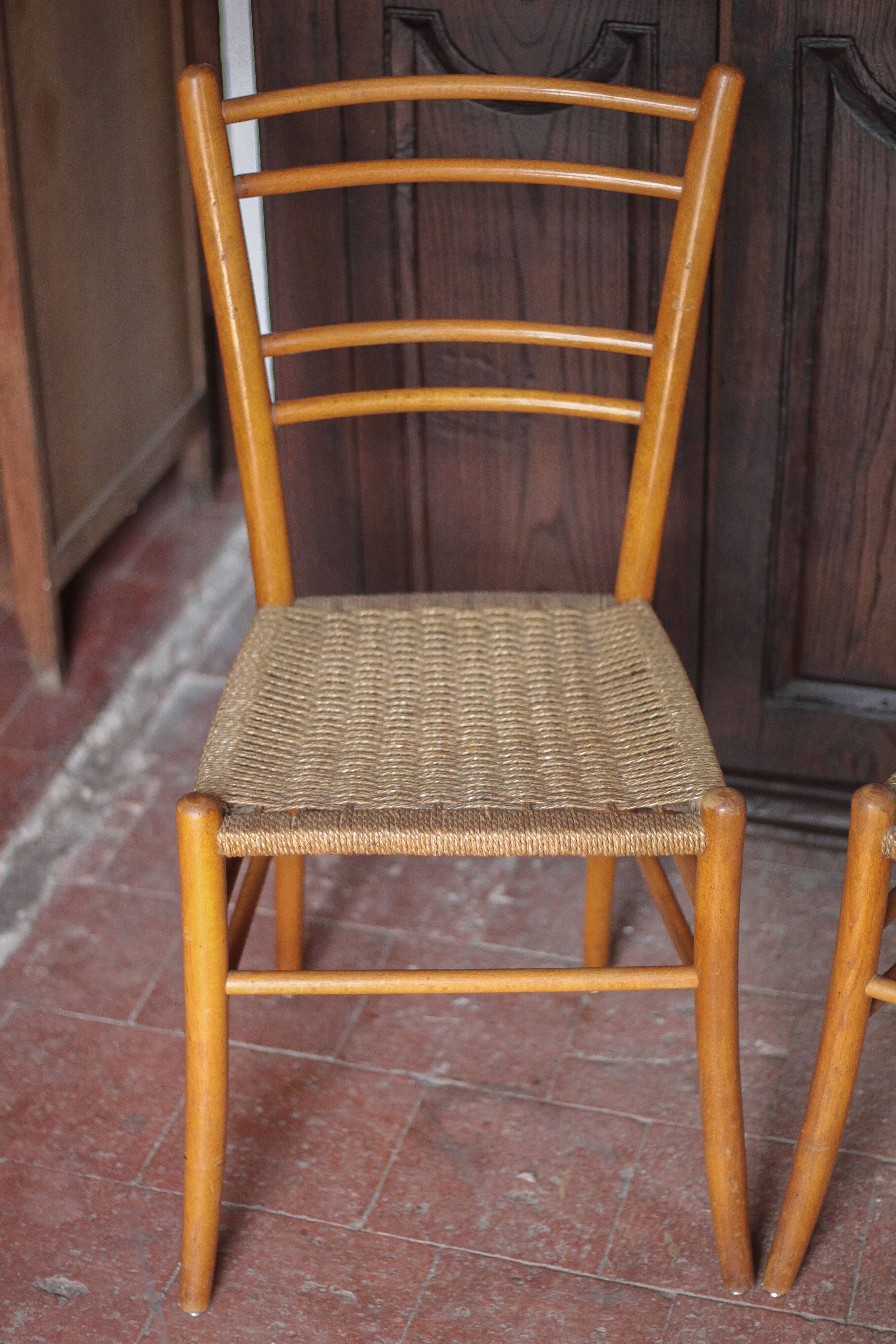 Pair of wooden chairs with vintage rope seats, vintage rope chairs