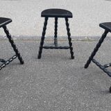 Set of tripod stools with fluted legs