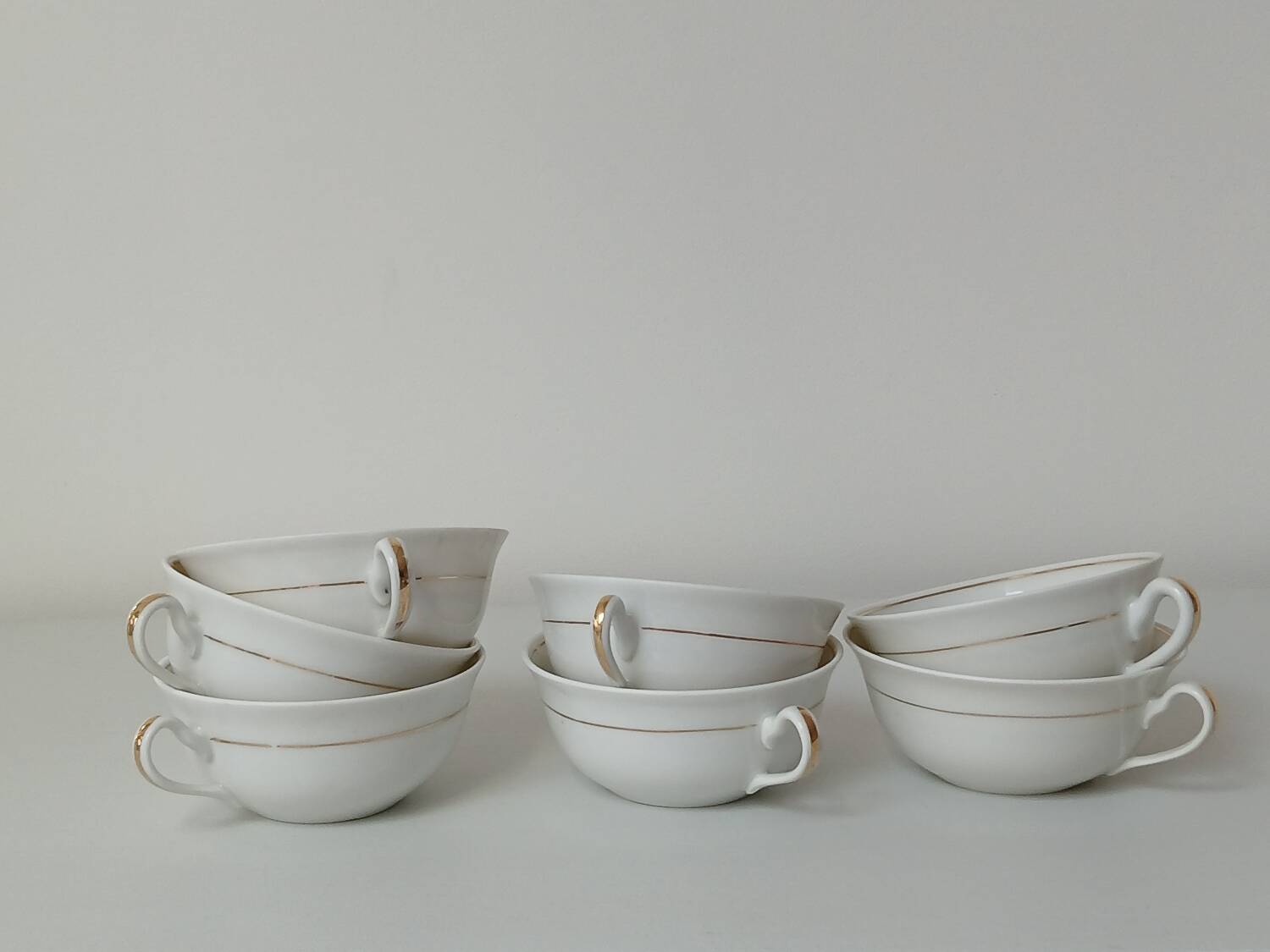 Set of 7 Limoges porcelain cups and saucers