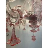Chandelier in transparent and pink Murano-style glass with flower and leaf.