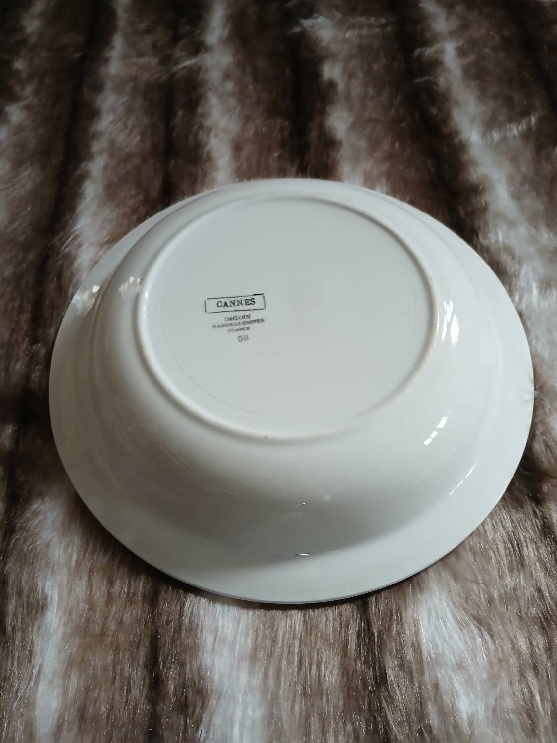 Large round antique plate from Digoin and Sarreguemines.
