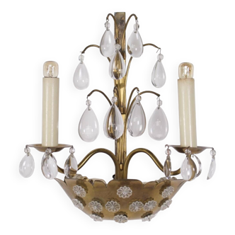 Brass floral wall lamp with tassels.