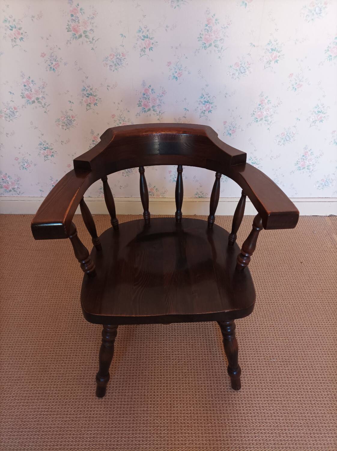 Armchair with wooden armrests