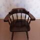 Armchair with wooden armrests