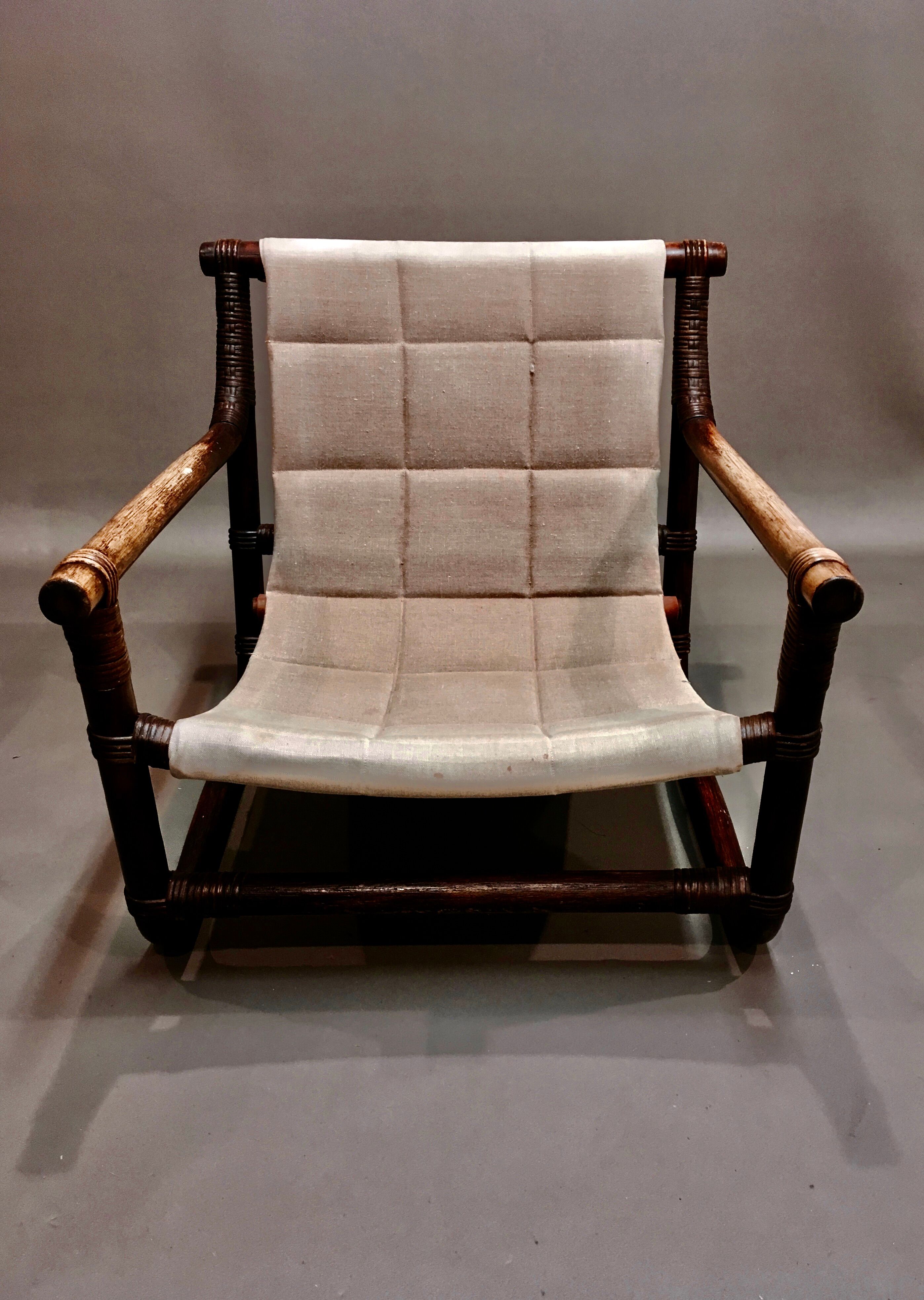 Fauteuil et son ottoman rotin et cuir 1950