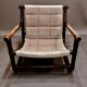 Fauteuil et son ottoman rotin et cuir 1950