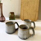 Trio of stoneware mugs