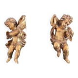 Paire d'anges en bois doré à la feuille d'or