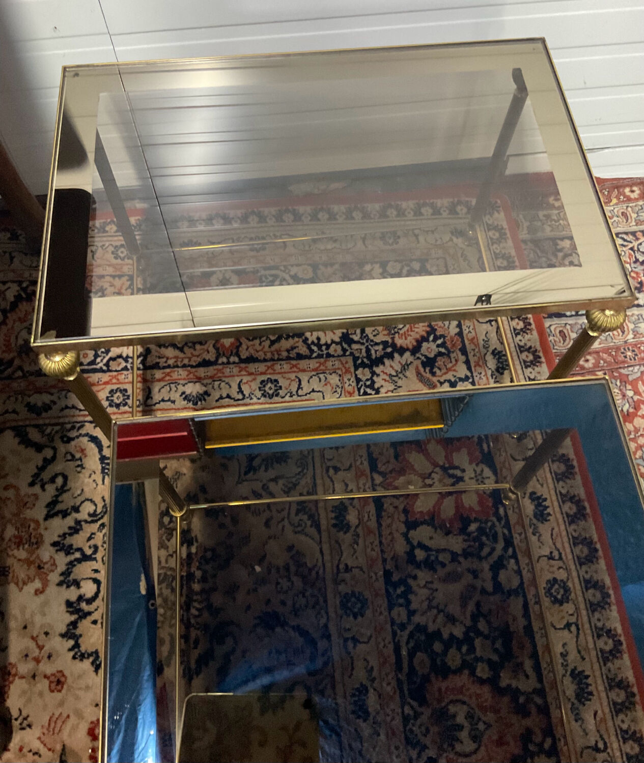 Series of 3 empire style nesting tables in brass and glass
