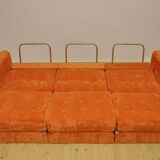 Orange corduroy modular sofa, 1970s.