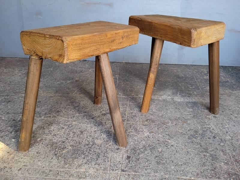 Pair of low stools in old patinated solid wood