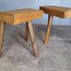 Pair of low stools in old patinated solid wood
