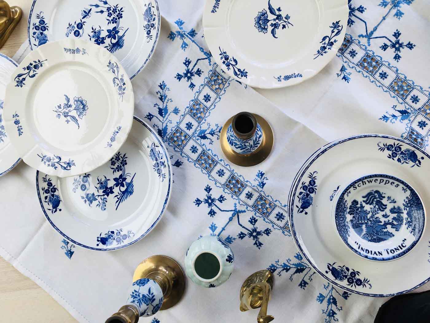 Delft brass and porcelain candlestick duo