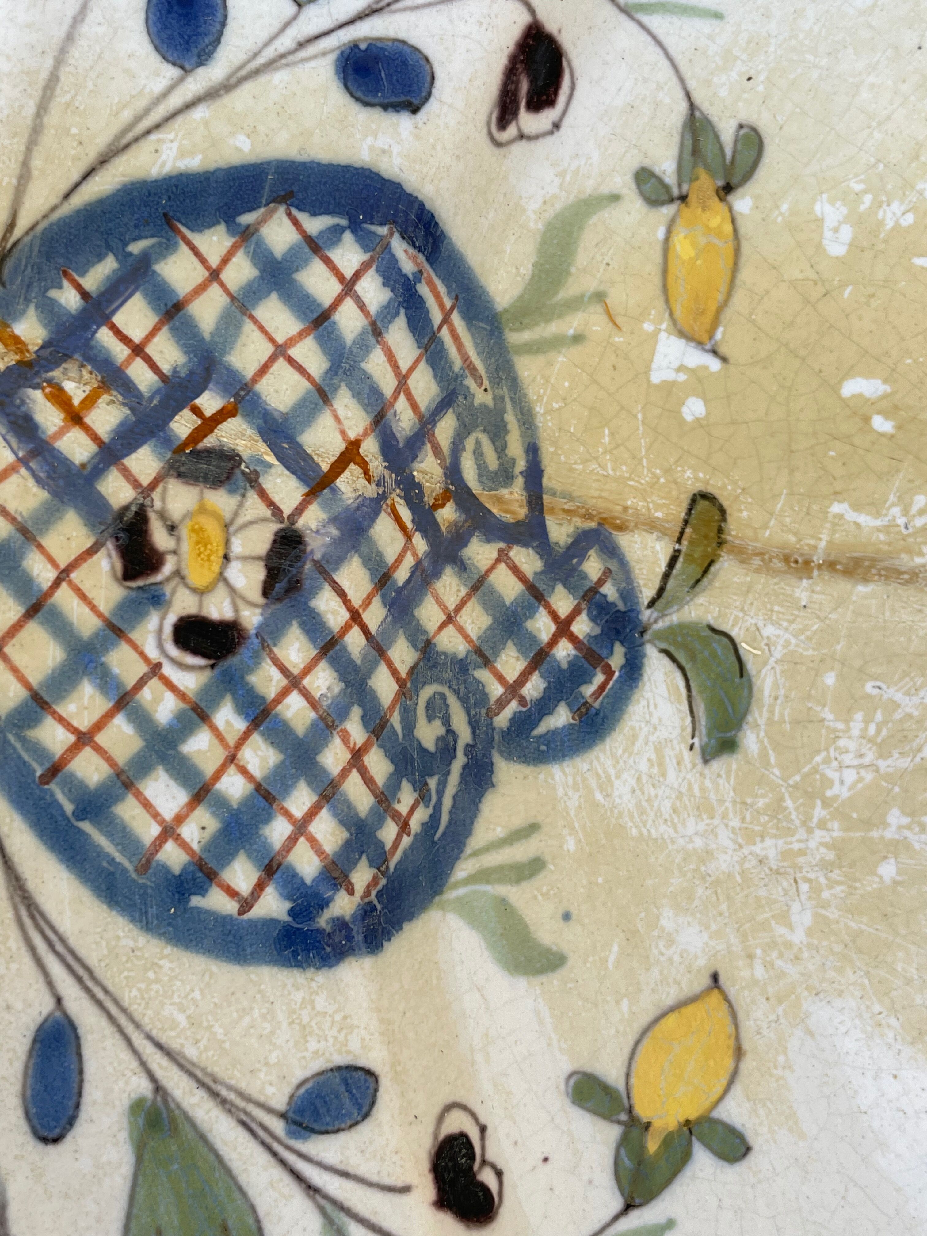 Restored antique dish with floral motif