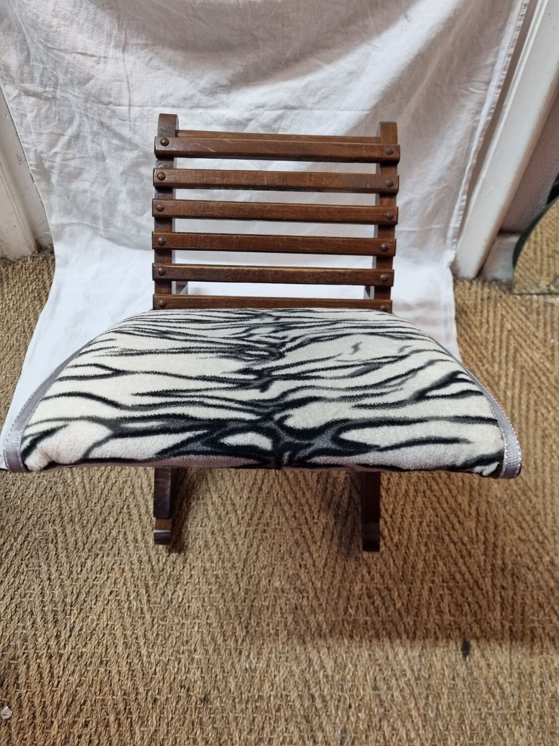 Zebra rocking footrest from 1960