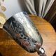 Verre à pied, calice en metal argenté gravé