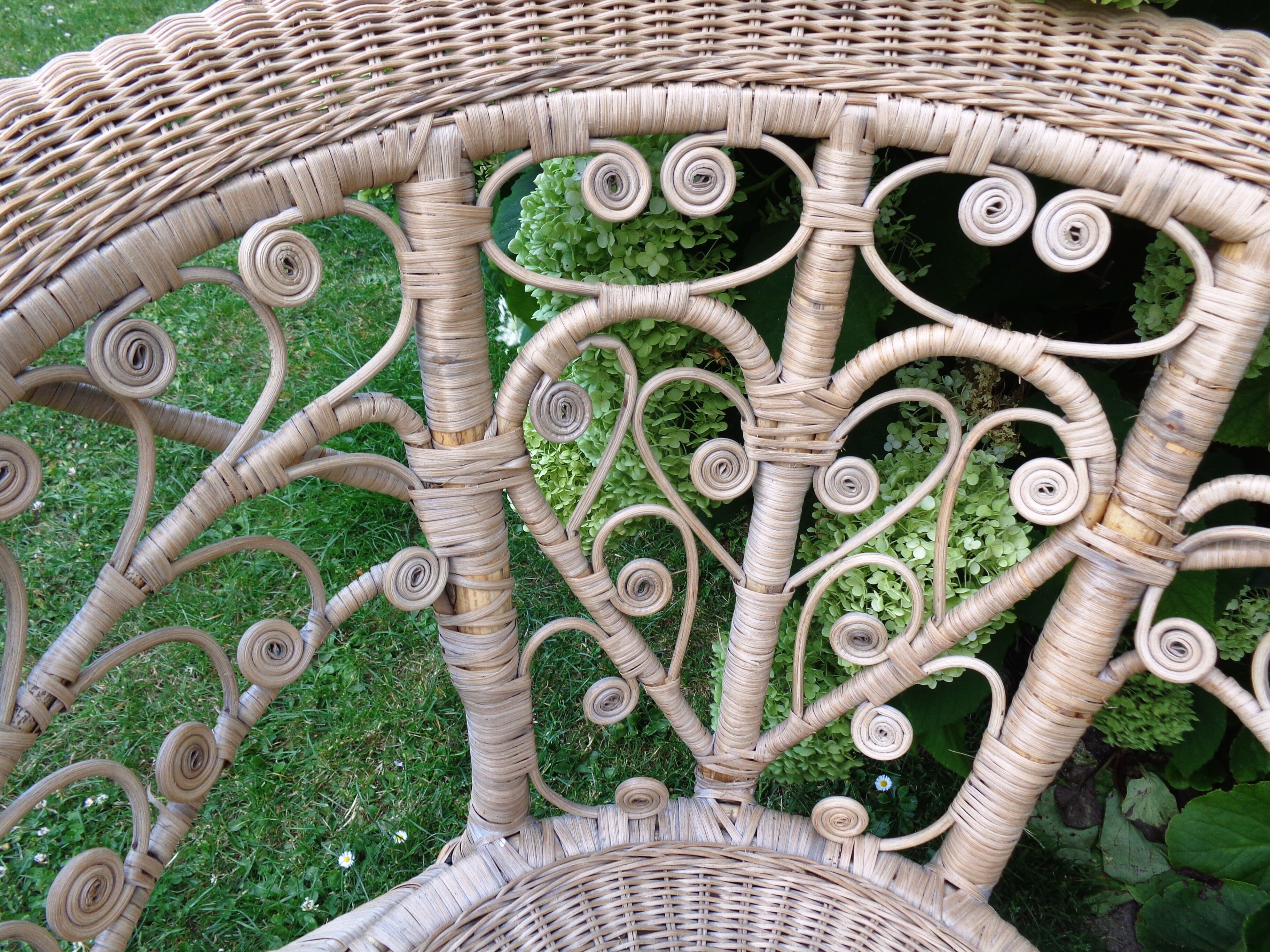 Pair of vintage rattan peacock armchairs