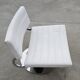 Pair of postmodern swivel armchairs in leather and chrome, Italy 1970s.
