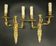 Pair of large caryatid wall sconces in Louis XV style from the 19th century - gilded bronze.