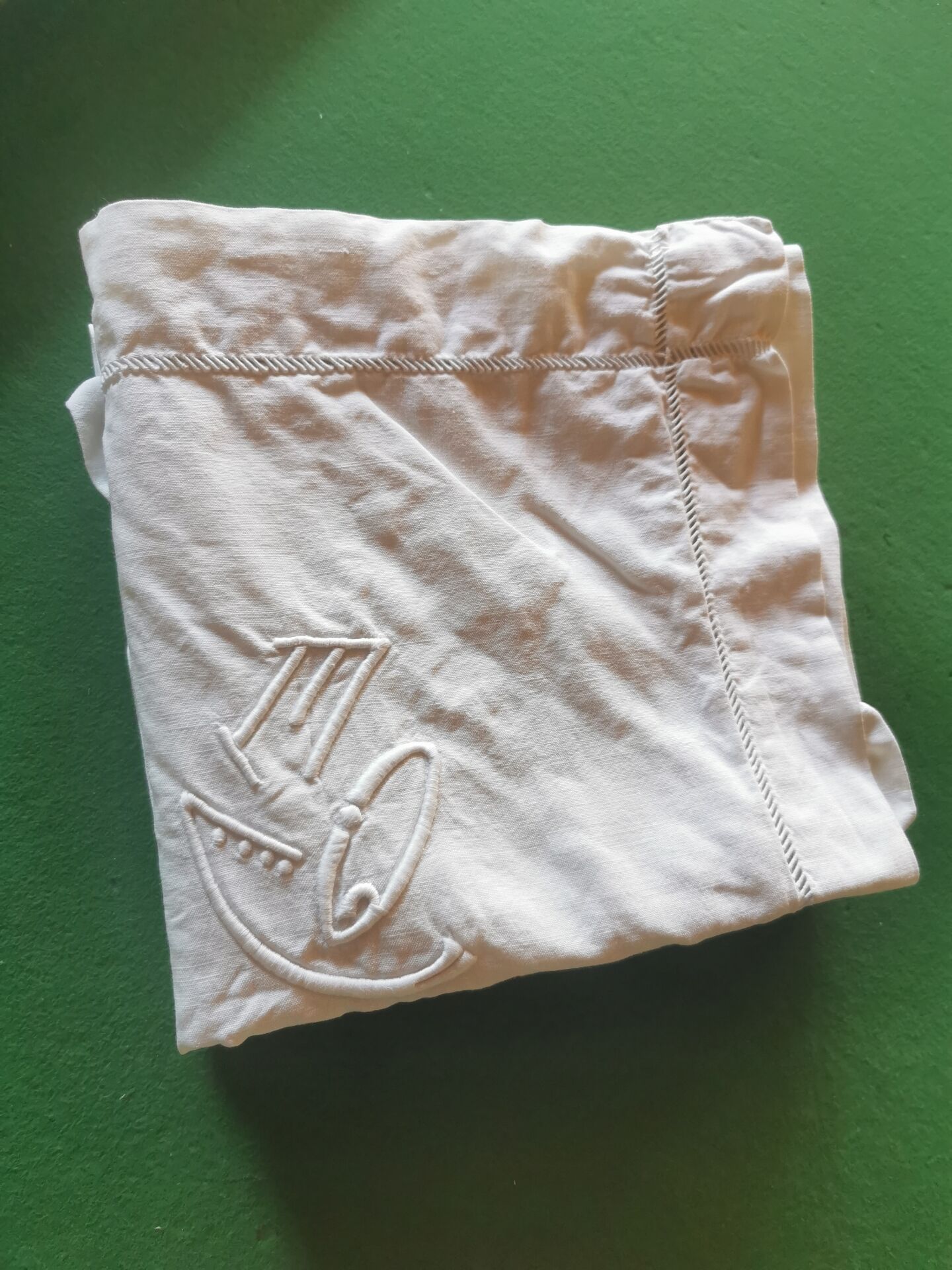 Pair of antique linen pillowcases with monogram