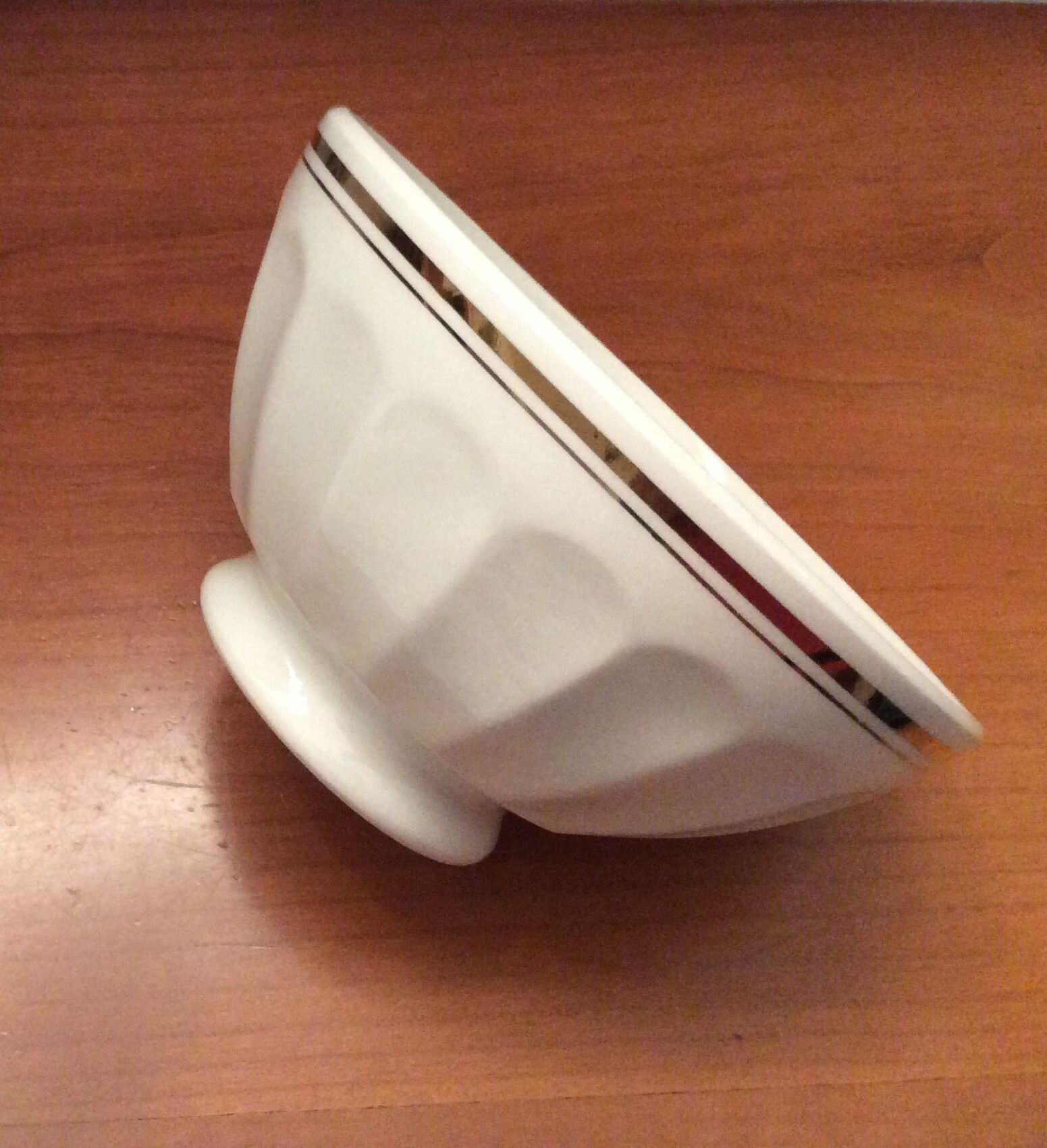 Old white bowl with faceted golden edging - vintage