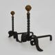 Large pair of wrought iron and brass ball fireplace andirons. 19th century