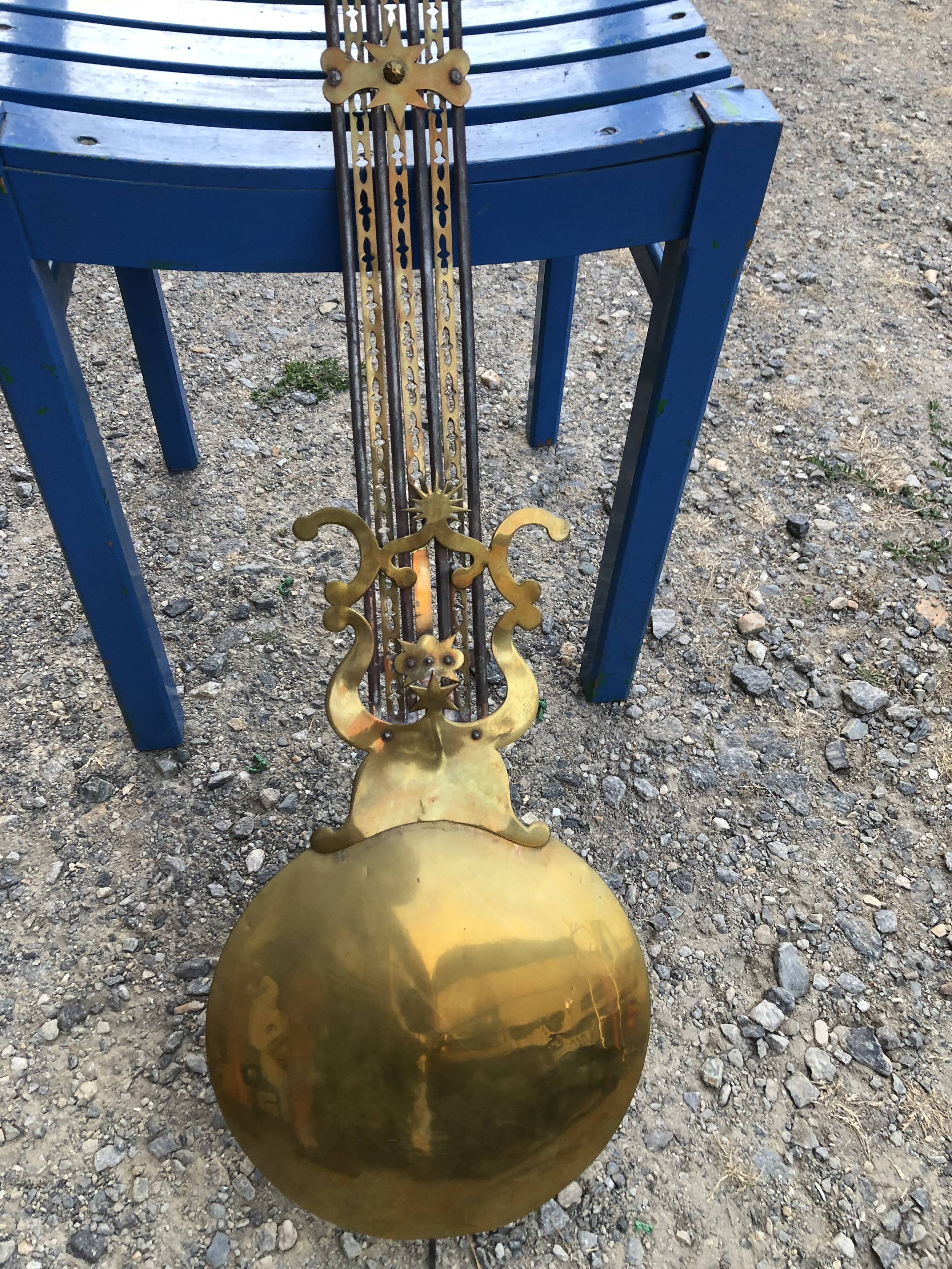 Comtoise clock in cherry style Louis XV period 19th region Fougères.