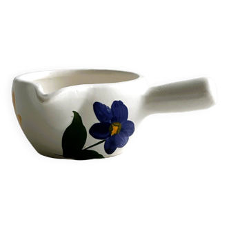 Ceramic gravy boat from Poterie du Marais, decorated with blue flowers.
