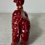 Burgundy and gold ceramic dog