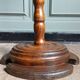 Turned solid wood side table stained with a quartz top.